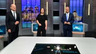 Streit um Klimaschutz und Sozialpolitik beim letzten TV-Triell vor der Wahl