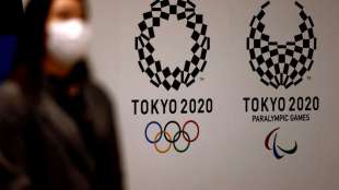 Zuschauer in Tokio: Entscheidung wom&ouml;glich erst im Juni
