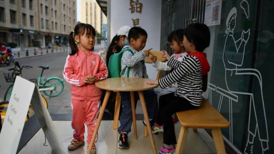 China lockert strenge Zwei-Kind-Politik und erlaubt Paaren drei Kinder