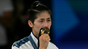 Gender-row boxer Lin targets Asian Games after bronze on comeback