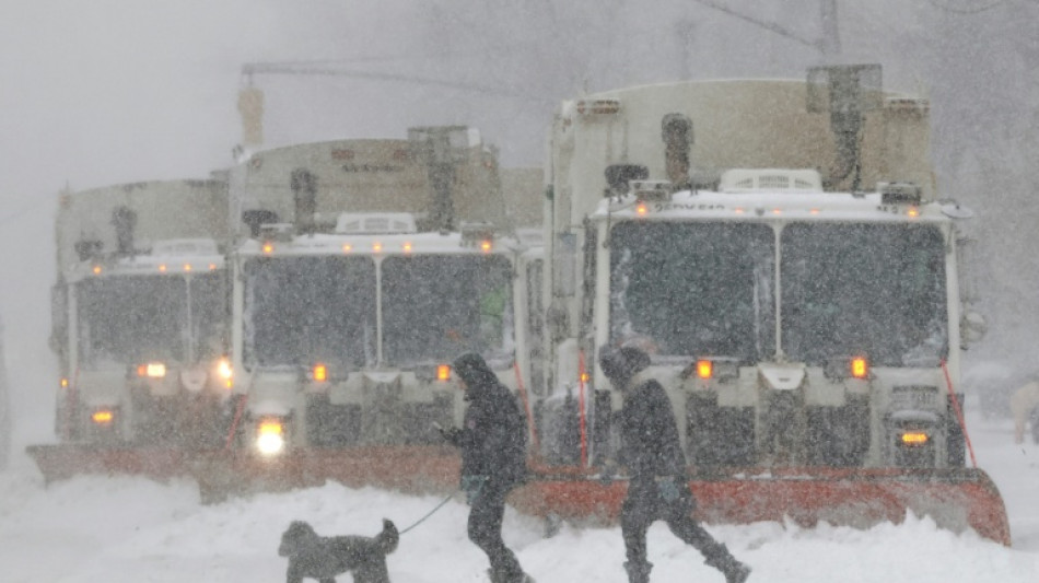 Bitter cold grips millions as US digs out of sweeping snowstorm