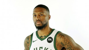 Lillard makes triumphant NBA pre-season debut with Bucks