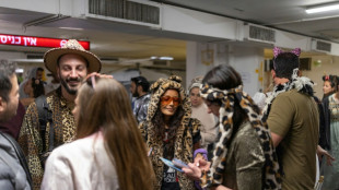 Underground party scene: Israelis celebrate Purim in air raid shelters