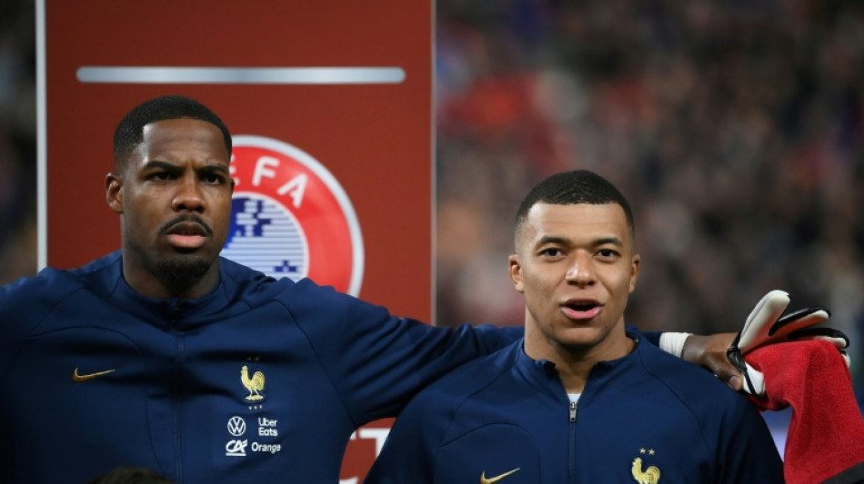 Milan's Maignan stands in way of old club PSG in Champions League