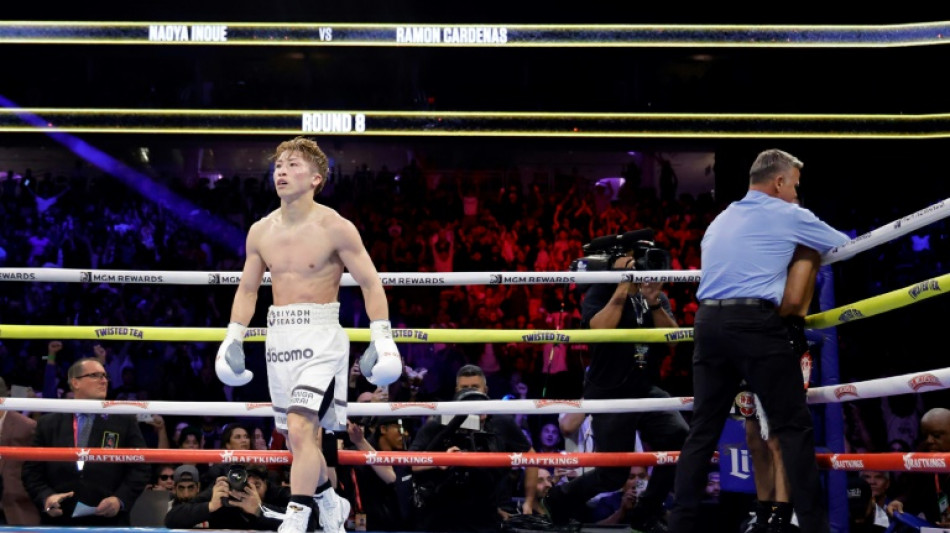 Inoue knocked down but stops Cardenas in eighth to keep crown