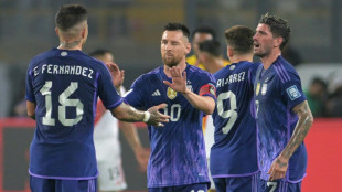 Messi double helps Argentina stay perfect, Neymar injured as Brazil slump