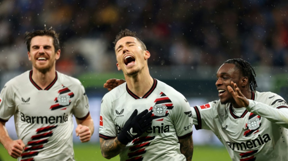 Grimaldo doubles up to take Leverkusen five clear 