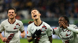 Grimaldo doubles up to take Leverkusen five clear 