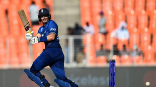 Root helps England to 282-9 as New Zealand apply brakes in World Cup opener