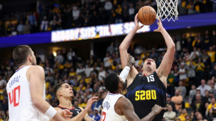 Jokic leads Nuggets past Clippers, Warriors and Wolves brawl