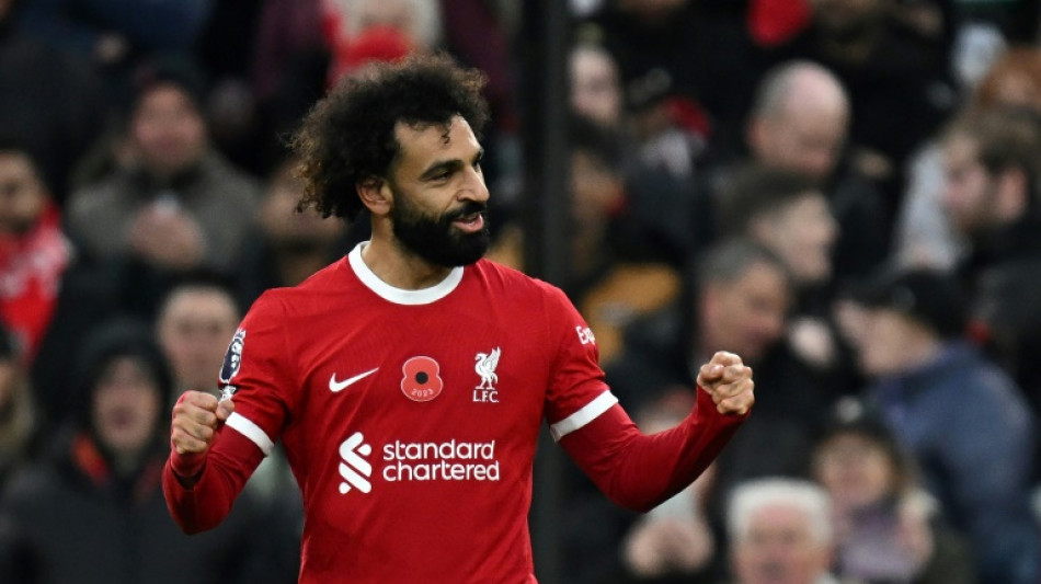 Salah extends scoring streak to send Liverpool joint top of Premier League