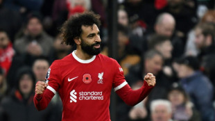 Salah extends scoring streak to send Liverpool joint top of Premier League