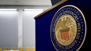 Stocks, dollar calm ahead of expected US rate cut