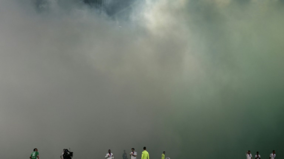 Ligue 1 derby interrupted after assistant referee hit by projectile 
