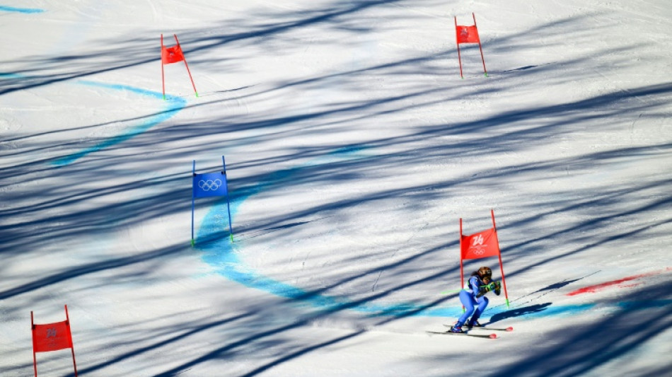 Brignone leads giant slalom in double Olympic gold bid, Shiffrin in striking distance