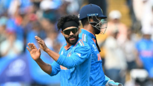 Spinners strike as India hold Bangladesh to 256-8