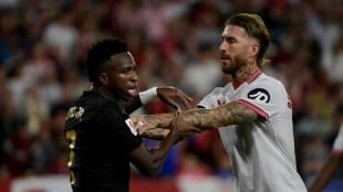 Ramos' Sevilla hold leaders Madrid in entertaining draw