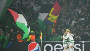 Celtic hold 10-man Atletico to get off Champions League mark