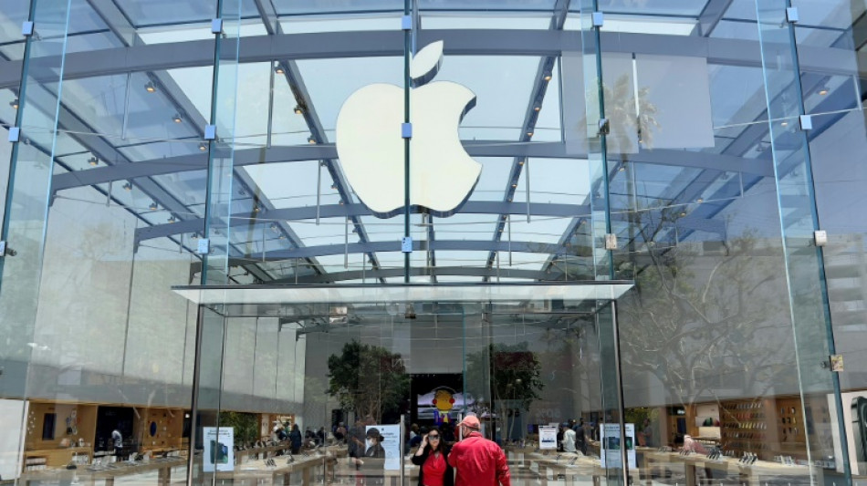Apple reports solid profits, but iPhone sales miss estimates