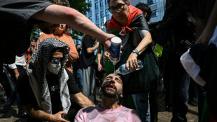 Sydney police pepper spray protesters during rallies against Israeli president's visit