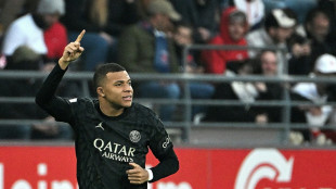 Mbappe hat-trick takes PSG top of Ligue 1