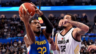 Philippines break basketball drought as Japan defy crowd for gold