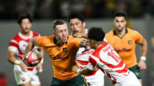 Wallabies squeeze past Japan to give Kiss a winning start