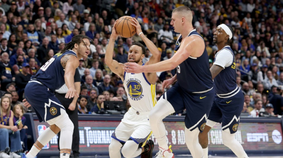 Jokic leads Nuggets past Warriors in NBA thriller