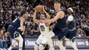 Jokic leads Nuggets past Warriors in NBA thriller