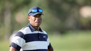 Woods undergoes lower back disc replacement surgery