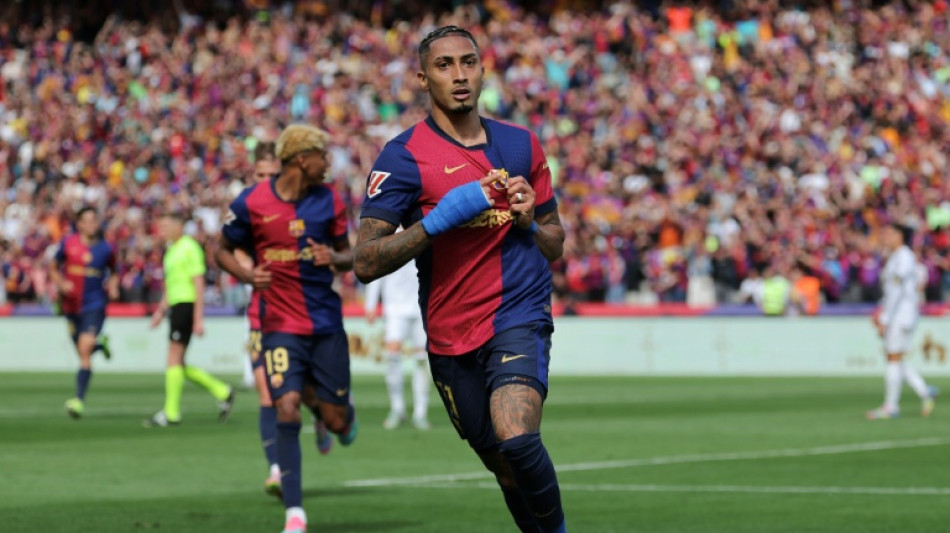 Barca edge Real Madrid in thriller to move to brink of Liga title